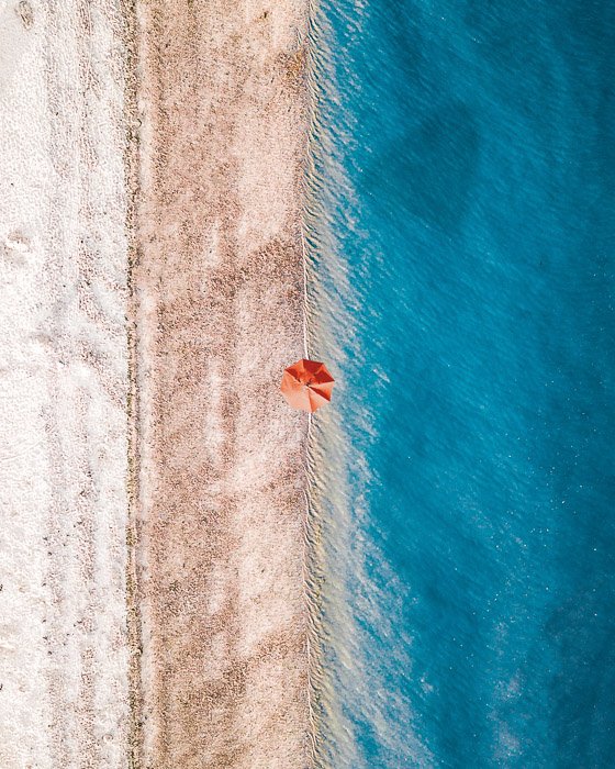 An aerial shot of a beach landscape demonstrating balance in photography