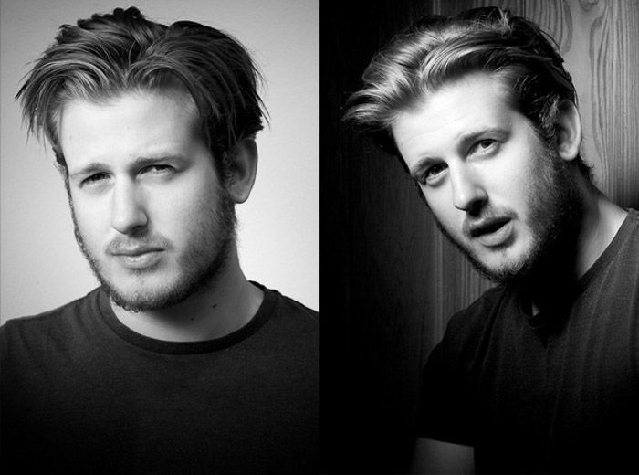 Black and white headshot photography of a young male model