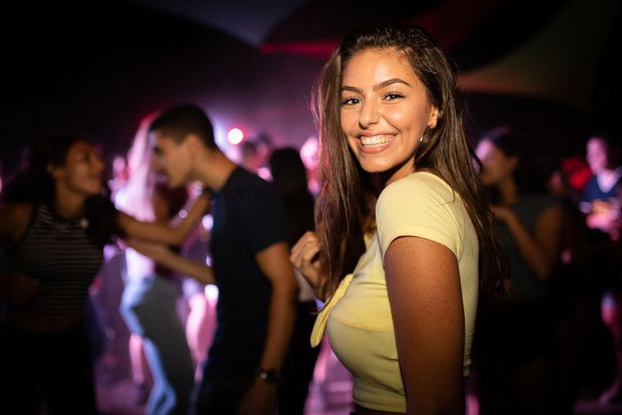 Woman smiling at a party 