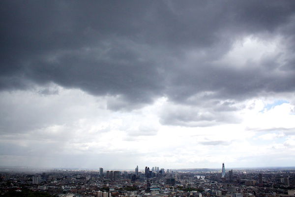 clouds and skyline of a city 