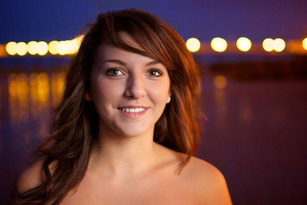 Portrait of a young woman with bokeh in the background