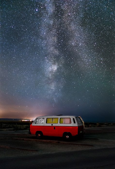 A red van parked right in front the Milky Way in Cap-Blanc-Nez (France)