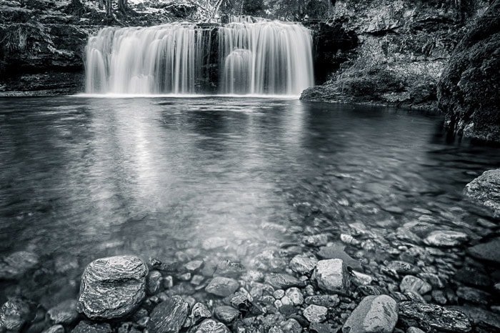 Silky motion blur in the water of Ferrera Waterfall, Italy