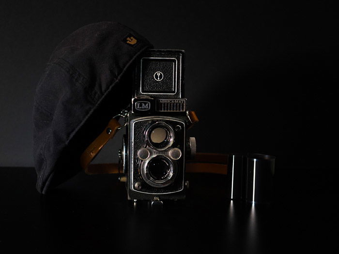 A Yashica-MAT LM TLR 6X6 medium format camera, on a black background