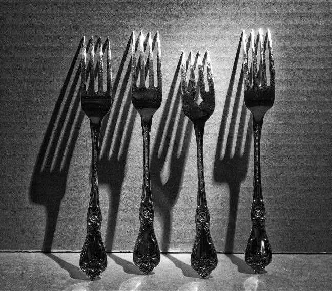 photo of forks with shadows