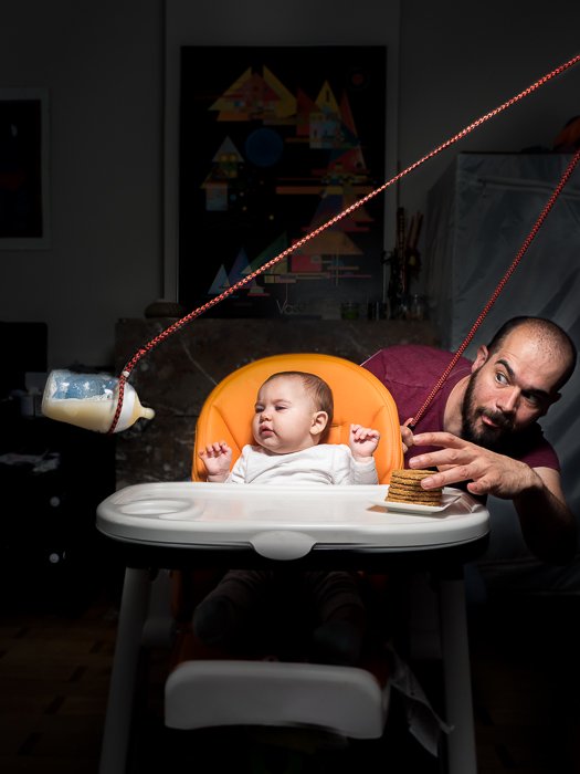 Humorous portrait of a father and son lit exemplifying butterfly lighting