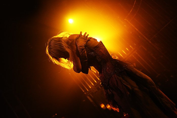 Emilie Autumn - Portrait against orange light.