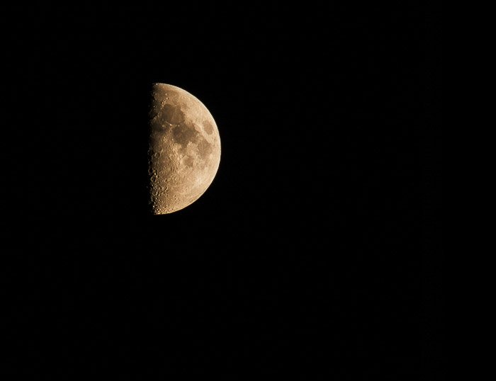 A close up photo of a half moon