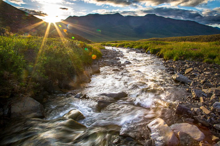 River landscape with perfect exposure. Soft water and sun-rays in image.