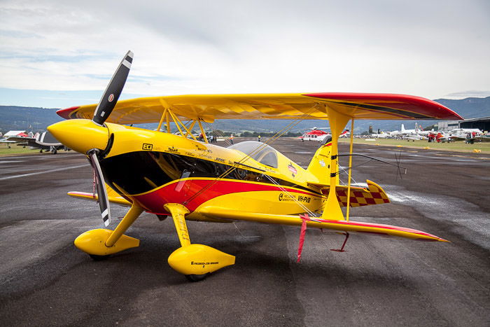 Vibrant seaplane on display at a regional airshow.