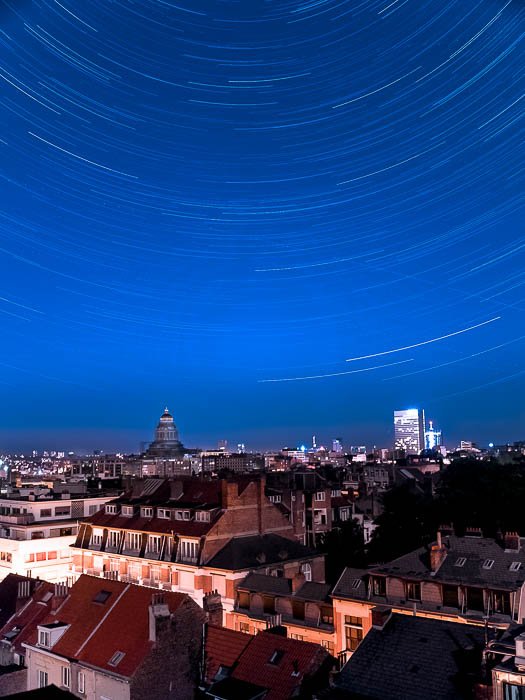 Star trails over Brussels city centre