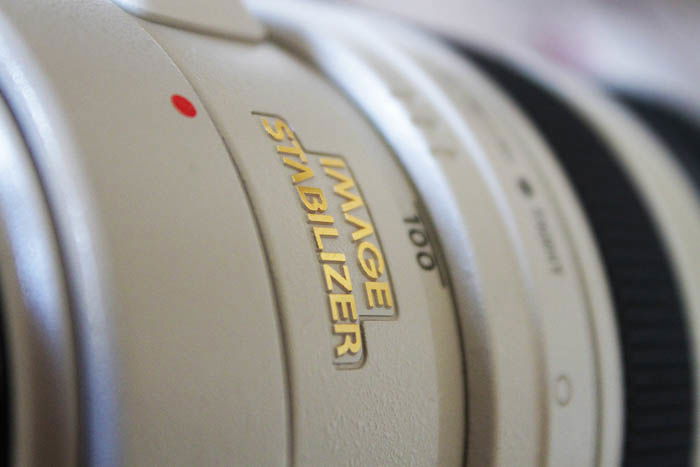 close up of the image stabiliser text on a lens