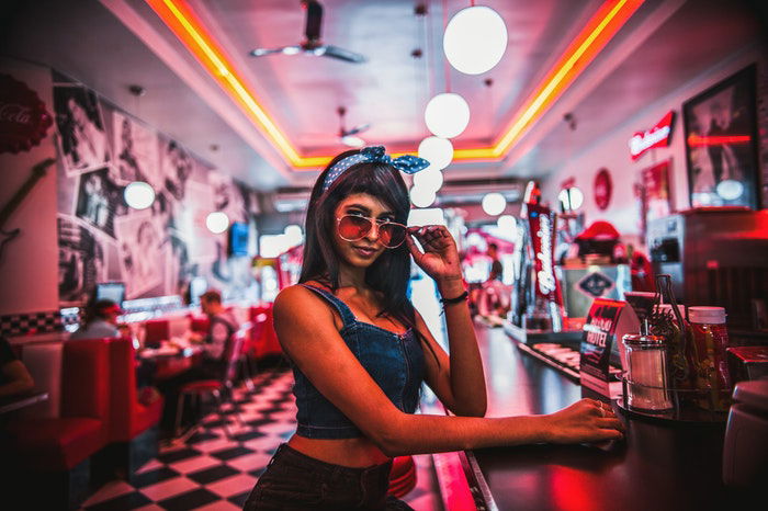 A cute girl in a diner