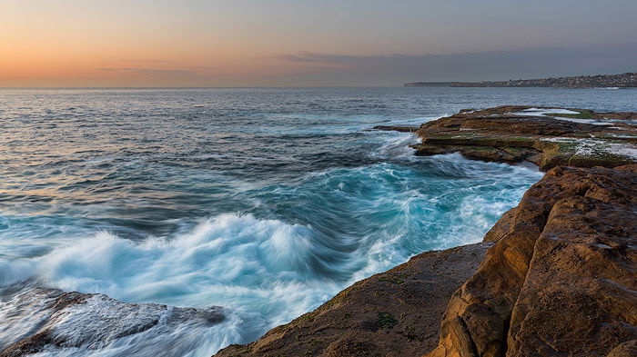 Rocky waves on a coastal seascape 