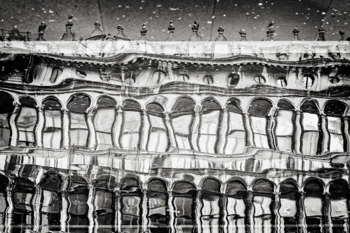 Abstract architectural photography reflection shot in a puddle