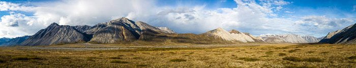 A stunning panoramic image of a mountainous landscape