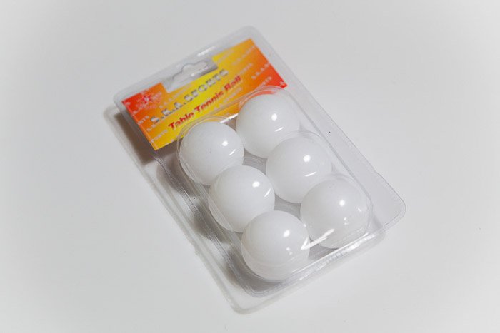 A packet of table tennis balls for DIY photography lighting 