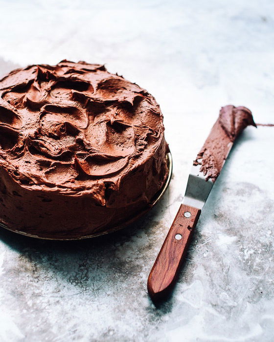 A chocolate cake with chocolate frosting.