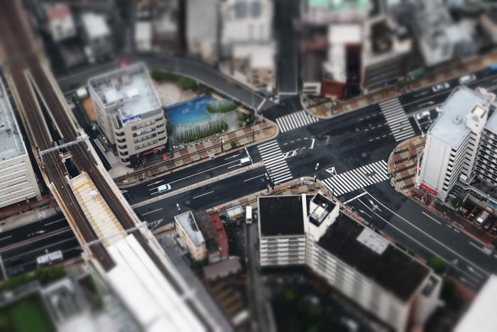birdeye photo of a street and buildings shot with a tilt shift lens
