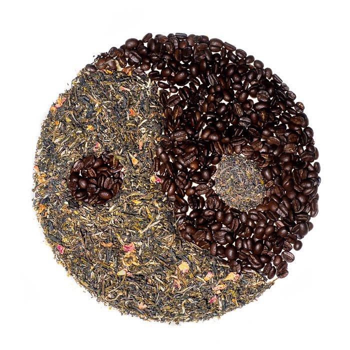Creative flat lay of coffee and tea yin yang symbol