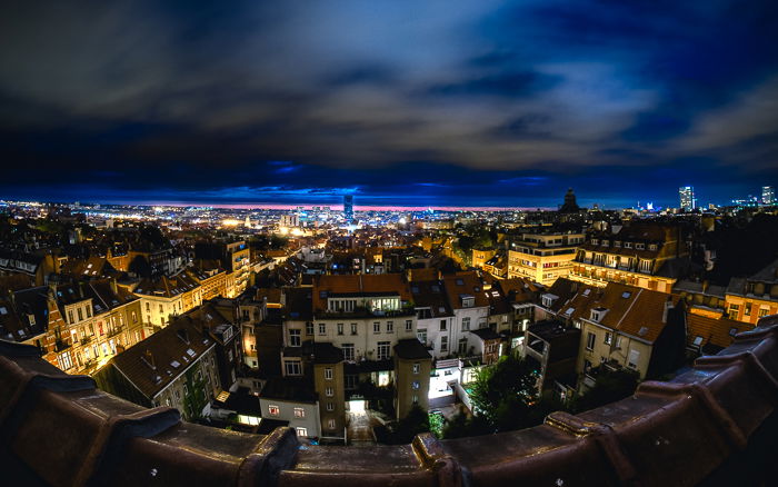 brussels cityscape taken from a rooftop at night