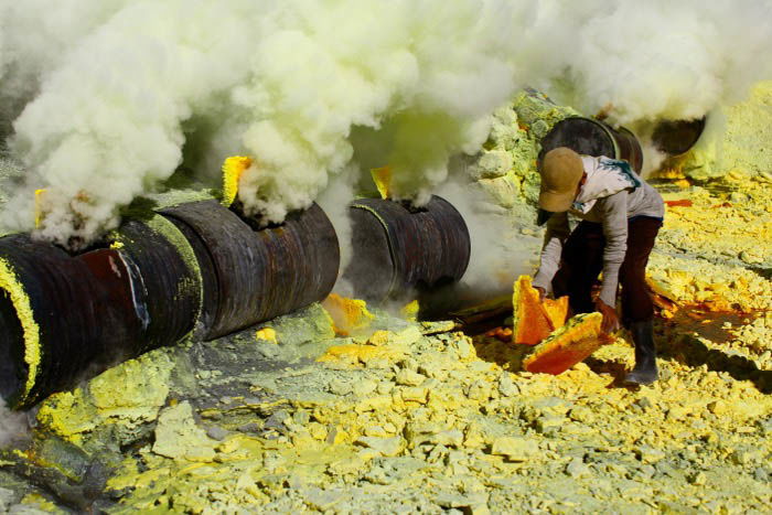 An image of a man mining sulphur - travel photography