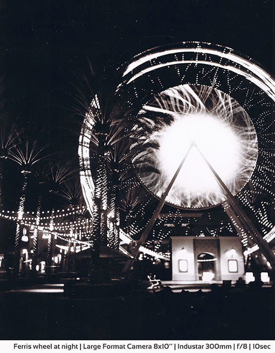 Positive paper film photography of a ferris wheel