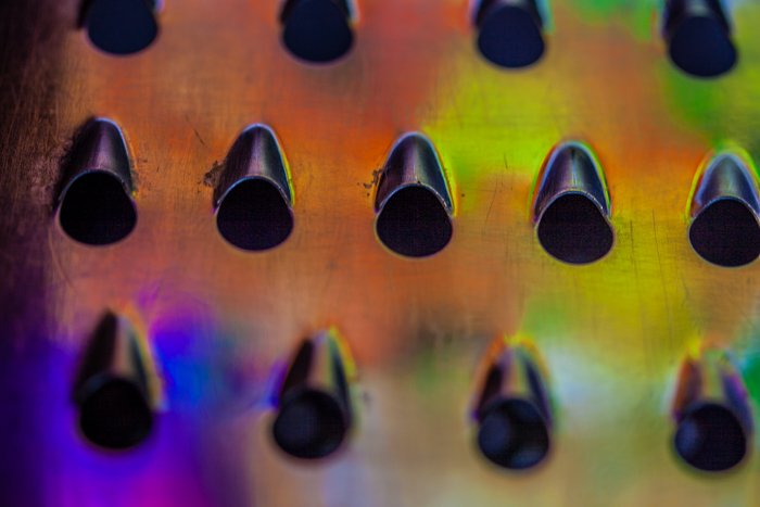 Abstract macro photography of shedder encompassed in colourful light