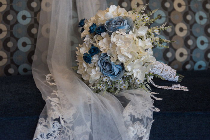 A wedding bouquet on a veil