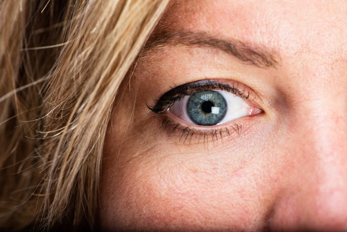 A close up of one side of a female models face