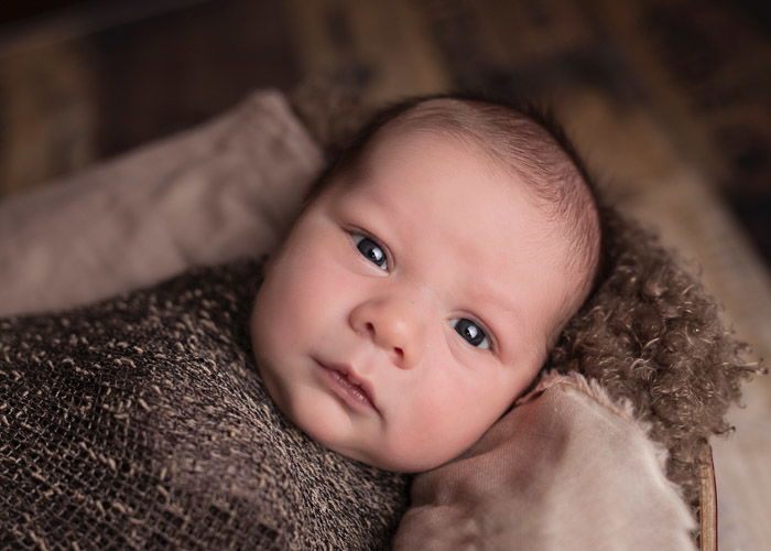 A close up portrait of a newborn baby