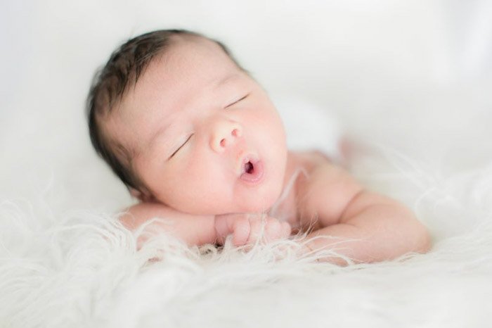 Cute close up portrait of a newborn baby