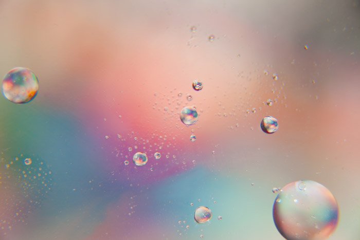 iridescent background with colored bubbles - Amazing Abstract Photography with Oil and Water