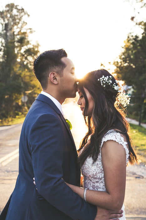 Wedding portrait of the couple embracing outdoors