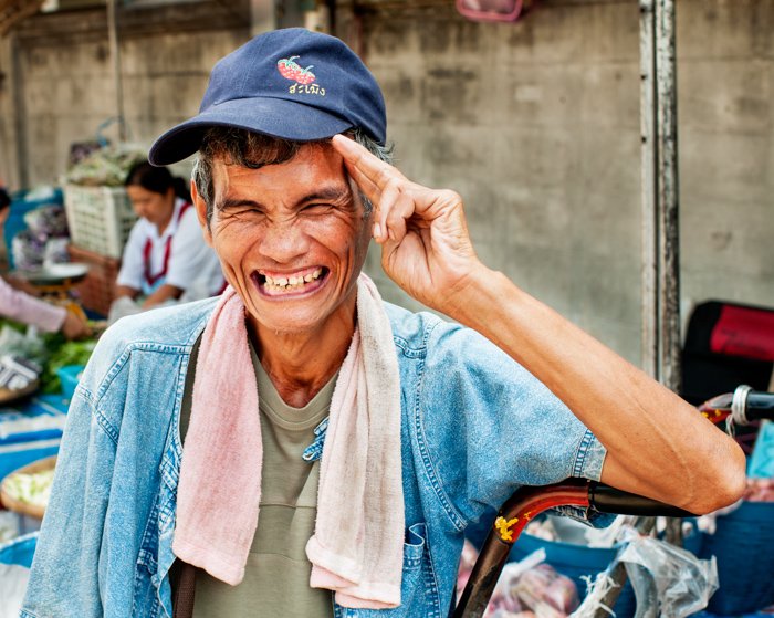 Documentary photography portrait of a porter in a Market in Chiang Mai, Thailand.