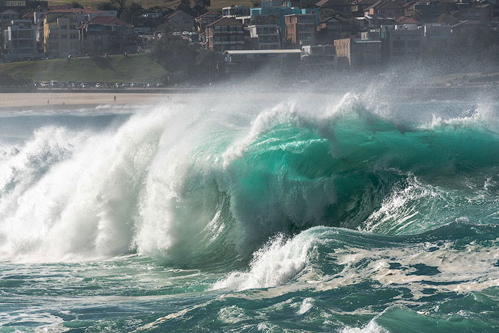 Dramatic wave photography taken with a telephoto lens. 