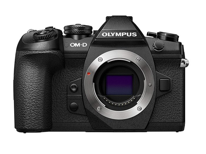 Image of a Olympus OM-D E-M1 II cameraon white background. Panasonic gh5 review.