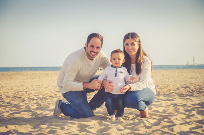 portrait of couple with baby boy against window with copyspace Stock Photo  - Alamy