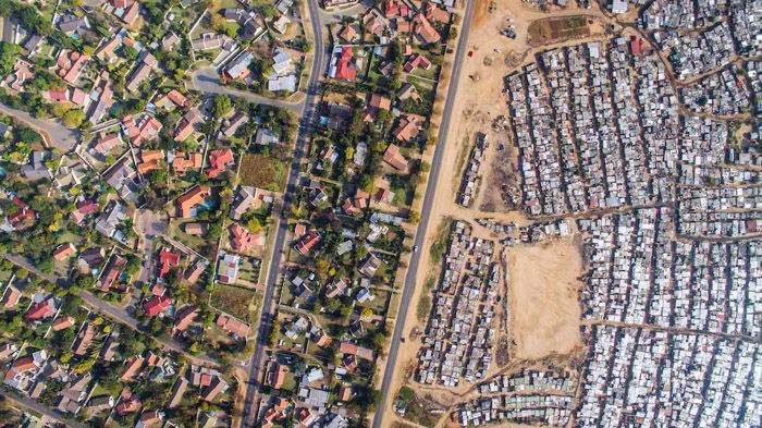 Aerial shot of buildings and roads demonstrating conceptual weight balance