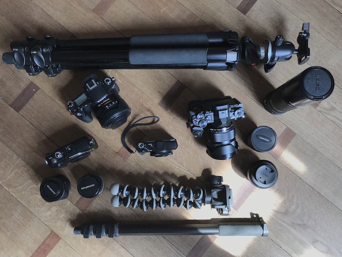 Overhead shot of photography equipment - best way to backup photos when travelling