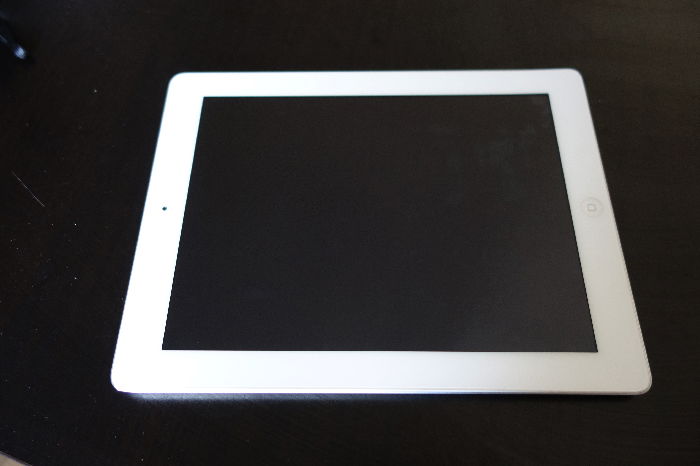 A white iPad tablet - travel photography tips for best way to backup photos