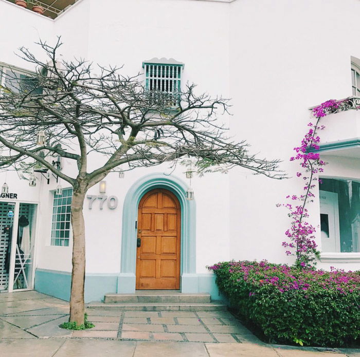 Bright and airy architecture photography of a white walled house. Instagram tips for social media photography.