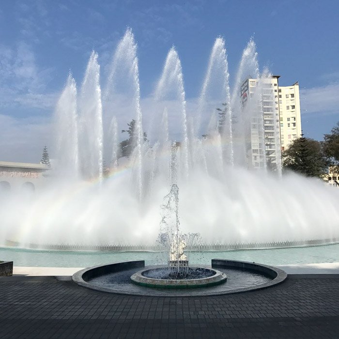 Street photography of a fountain. Instagram tips for social media photography.