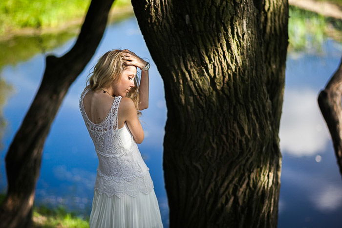 Beautiful little girl in nature poses to camera. Stock Photo | Adobe Stock