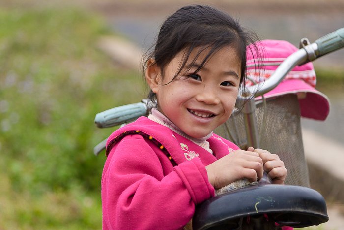Portrait photography of a girl in minority village in Mai Chau in Vietnam, 