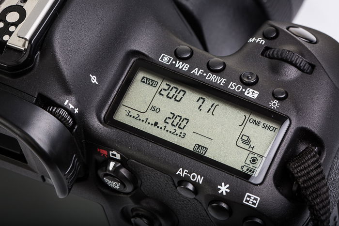 A close up of a DSLR camera's settings