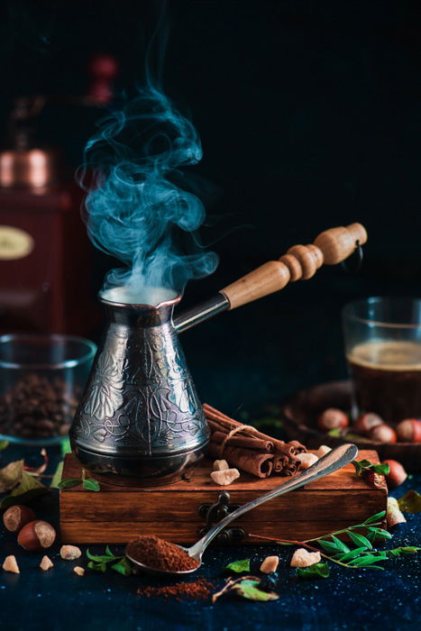 Magical still life of brewing equipment shot on dark background