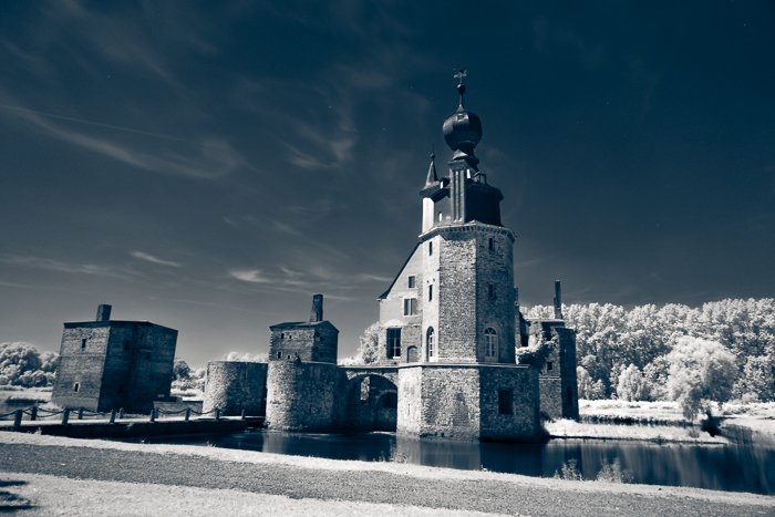 An infrared photo of a stone tower