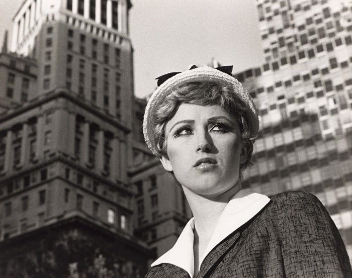 Low-angle shot of woman in a hat by Cindy Sherman