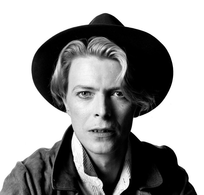 Black and white portrait of David Bowie in a hat